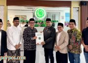 H. Achmad Fauzi Wongsojudo Resmi Terima SK Kepengurusan MUI Jawa Timur
